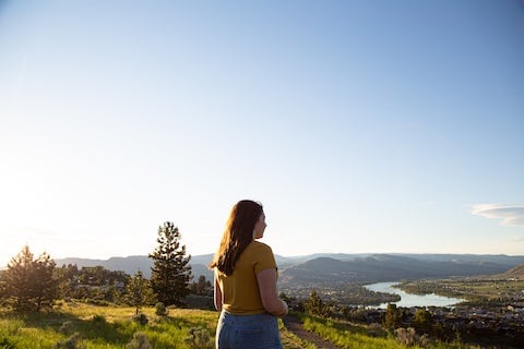 student looking at Thompson Valley